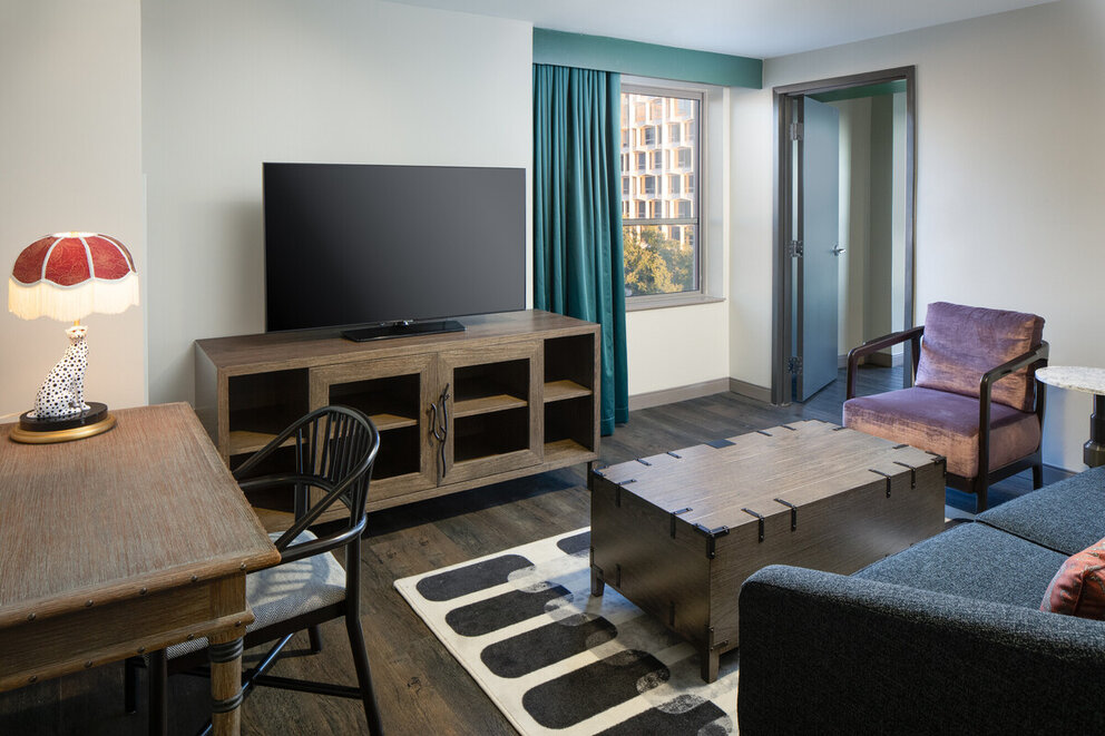 living space of the junior suite with two queen beds