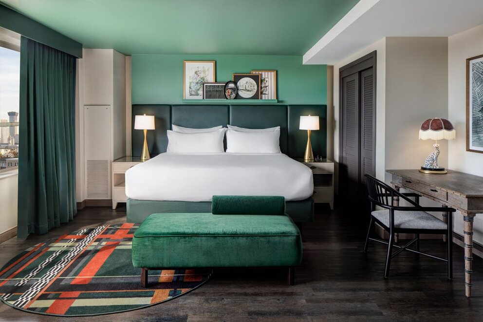 wide view of the junior suite with one king bed