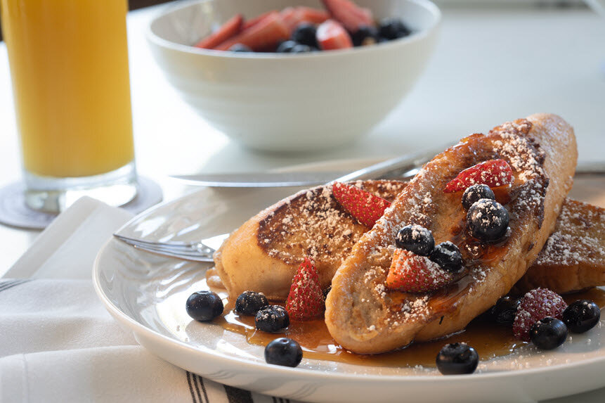 a plate of food with fruit on it