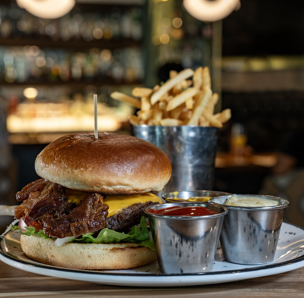 a burger and fries on a plate